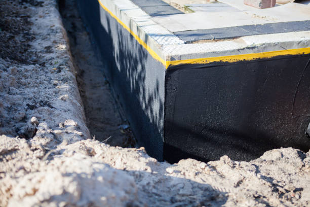 Professional Wet Basement Repair technician working in Hampton, TN